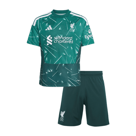 Front view of the kids' Liverpool 2026/27 kit in green with white crest details and an abstract geometric pattern